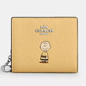 NWT Coach x Peanuts Snap Wallet featuring Charlie Brown